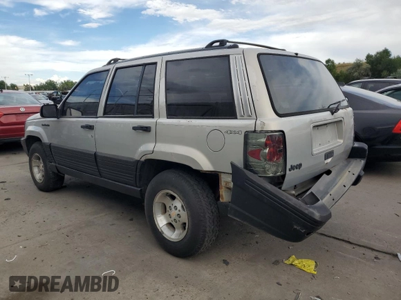 1995 Jeep Grand Cherokee Laredo with VIN 1J4GZ58S2SC703196, listed as a Copart auction lot 68571944 with 264,876 mi miles and Clean Title. Bid and sale history available at carsss.com. Image 2.