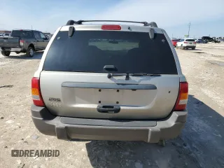 2003 Jeep Grand Cherokee Laredo with VIN 1J4GX48S43C516026, listed as a Copart auction lot 45264525 with 113,222 mi miles and Salvage Title. Bid and sale history available at carsss.com. Image 6.