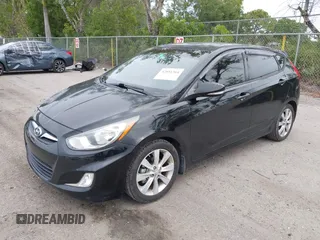 2013 Hyundai Accent SE with VIN KMHCU5AE8DU109616, listed as a IAAI auction lot 42051364 with 96,739 mi miles. Bid and sale history available at carsss.com. Image 18.