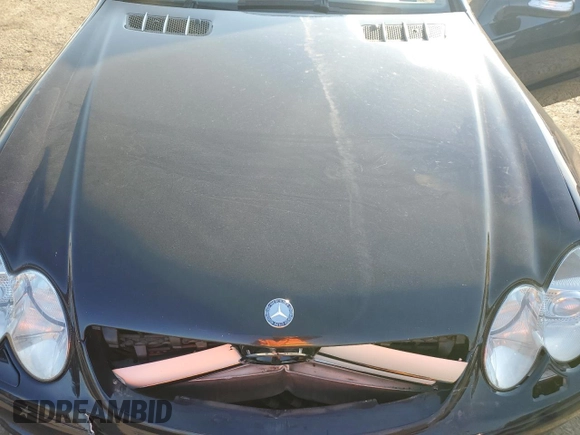 2007 Mercedes-Benz SL 550 z VIN WDBSK71FX7F134907, wystawiony jako Copart lot #51100175 z przebiegiem 133 355 mil mil oraz Szkoda całkowita • Salvage title. Historia ofert i sprzedaży dostępna na DreamBid. Obrazek 11.