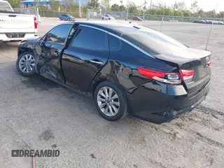 2018 Kia Optima LX with VIN 5XXGT4L38JG256924, listed as a IAAI auction lot 41267413 with 129,820 mi miles and . Bid and sale history available at DreamBid. Image 3.