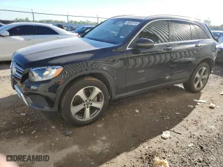 2019 Mercedes-Benz GLC with VIN WDC0G4JB4KV119737, listed as a Copart auction lot 80823114 with 74,987 mi miles and Salvage Title. Bid and sale history available at carsss.com. Image 1.