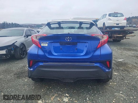 2018 Toyota C-HR XLE with VIN NMTKHMBX1JR063883, listed as a Copart auction lot 52885395 with 185,922 mi miles and Salvage Title. Bid and sale history available at DreamBid. Image 6.