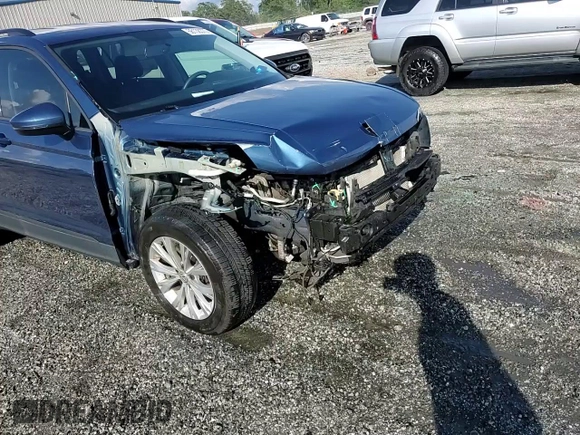 2018 Volkswagen Tiguan S with VIN 3VV0B7AX2JM019924, listed as a Copart auction lot 56138375 with 76,798 mi miles and Salvage title. Bid and sale history available at DreamBid. Image 14.