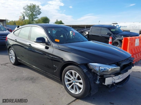 2014 BMW 3 Series Gran Turismo 328i xDrive with VIN WBA3X5C58ED556096, listed as a IAAI auction lot 40979072 with 80,544 mi miles. Bid and sale history available at carsss.com. Image 1.