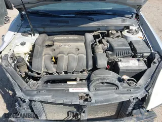 2008 Kia Optima LX with VIN KNAGE123685194798, listed as a IAAI auction lot 41895525 with 142,854 mi miles. Bid and sale history available at carsss.com. Image 10.