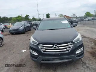 2014 Hyundai Santa Fe z VIN 5XYZUDLB8EG196450, wystawiony jako IAAI lot #42112914 z przebiegiem 91 710 mil mil oraz . Historia ofert i sprzedaży dostępna na DreamBid. Obrazek 6.