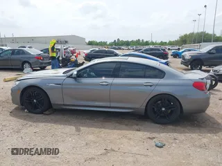 2014 BMW 6 Series 650i z VIN WBA6B2C55ED128934, wystawiony jako IAAI lot #42070641 z przebiegiem 102 597 mil mil oraz . Historia ofert i sprzedaży dostępna na DreamBid. Obrazek 14.