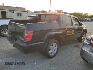 2010 Honda Ridgeline RTL with VIN 5FPYK1F52AB008326, listed as a Copart auction lot 71120074 with 157,688 mi miles and Salvage Title. Bid and sale history available at carsss.com. Image 3.
