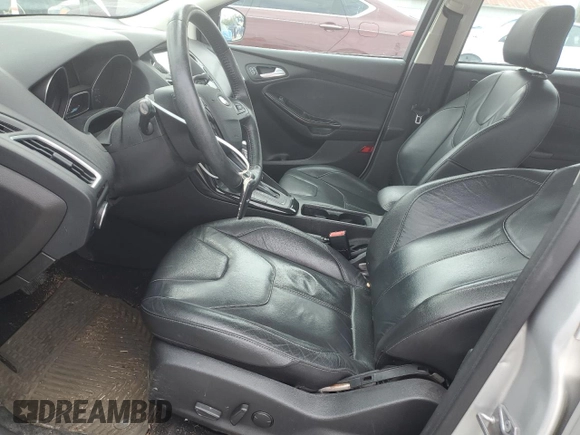 2016 Ford Focus Titanium with VIN 1FADP3J22GL354941, listed as a Copart auction lot 54401135 with 144,142 mi miles and Salvage title. Bid and sale history available at DreamBid. Image 7.