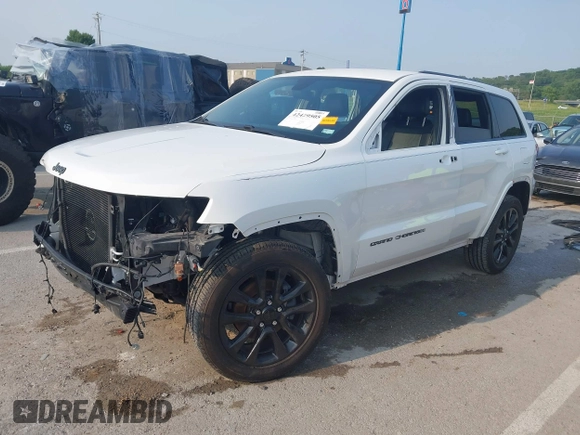 2018 Jeep Grand Cherokee Laredo with VIN 1C4RJFAGXJC121900, listed as a IAAI auction lot 42429505 with 72,351 mi miles and . Bid and sale history available at DreamBid. Image 20.