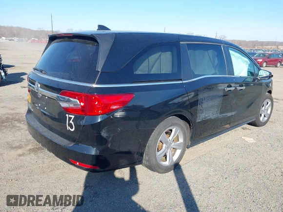 2019 Honda Odyssey EX-L with VIN 5FNRL6H77KB097835, listed as a IAAI auction lot 41768458 with 43,682 mi miles. Bid and sale history available at carsss.com. Image 4.