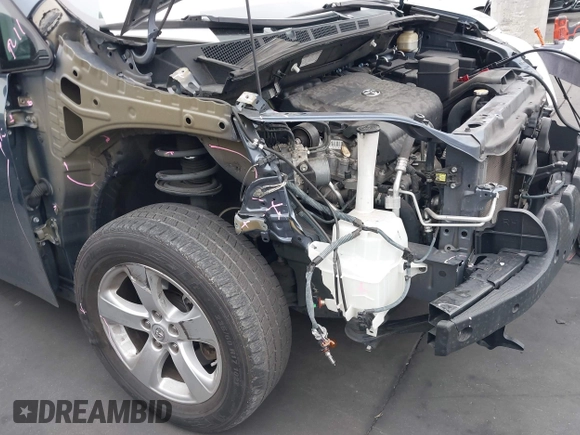 2015 Toyota Sienna LE AAS with VIN 5TDKK3DC7FS649602, listed as a IAAI auction lot 42152836 with 70,892 mi miles and . Bid and sale history available at DreamBid. Image 6.