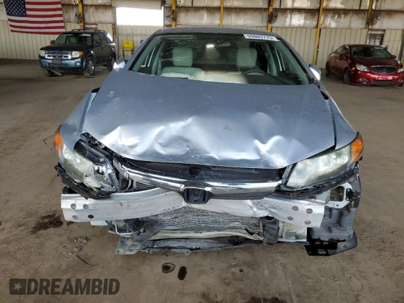 2012 Honda Civic LX z VIN 2HGFB2F59CH580899, wystawiony jako Copart lot #59803775 z przebiegiem 96 323 mil mil oraz Szkoda całkowita • Salvage title. Historia ofert i sprzedaży dostępna na DreamBid. Obrazek 5.
