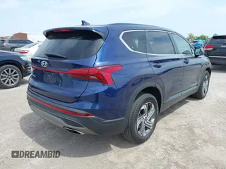 2021 Hyundai Santa Fe SE with VIN 5NMS14AJ2MH339403, listed as a IAAI auction lot 42024896 with 91,734 mi miles and . Bid and sale history available at DreamBid. Image 4.