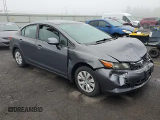 2012 Honda Civic LX z VIN 2HGFB2F50CH324974, wystawiony jako Copart lot #57442305 z przebiegiem 124 462 mil mil oraz Szkoda całkowita • Salvage title. Historia ofert i sprzedaży dostępna na DreamBid. Obrazek 4.