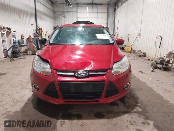2012 Ford Focus SE z VIN 1FAHP3F21CL114445, wystawiony jako IAAI lot #42277986 z przebiegiem 89 317 mil mil oraz . Historia ofert i sprzedaży dostępna na DreamBid. Obrazek 12.