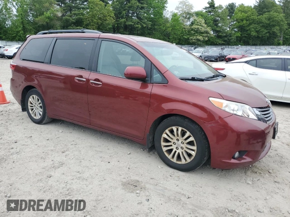 2015 Toyota Sienna XLE with VIN 5TDYK3DC1FS648469, listed as a Copart auction lot 57471975 with 118,567 mi miles and Non repairable. Bid and sale history available at DreamBid. Image 4.