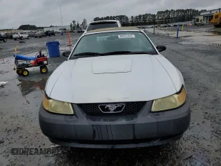 2004 Ford Mustang Deluxe with VIN 1FAFP446X4F179975, listed as a Copart auction lot 84551444 with 75,919 mi miles and Salvage Title. Bid and sale history available at carsss.com. Image 5.