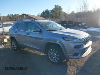 2017 Jeep Cherokee Overland z VIN 1C4PJMJS2HW599477, wystawiony jako IAAI lot #41335748 z przebiegiem 165 330 mil mil oraz . Historia ofert i sprzedaży dostępna na DreamBid. Obrazek 14.