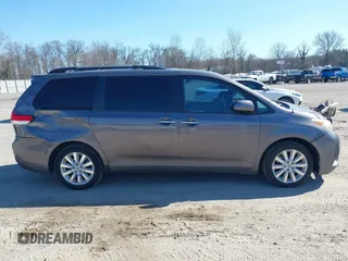 2012 Toyota Sienna XLE with VIN 5TDDK3DC5CS047530, listed as a IAAI auction lot 41780049 with 209,812 mi miles. Bid and sale history available at carsss.com. Image 14.