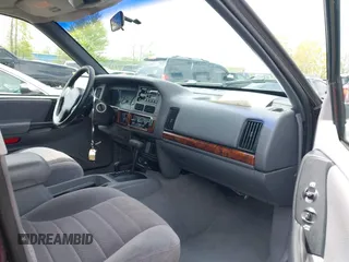 1997 Jeep Grand Cherokee Laredo with VIN 1J4GZ58S4VC702040, listed as a IAAI auction lot 42165536 with 121,803 mi miles and . Bid and sale history available at DreamBid. Image 5.