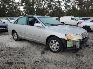 2002 Toyota Avalon XL with VIN 4T1BF28B32U263941, listed as a Copart auction lot 83993504 with 118,438 mi miles and Salvage Title. Bid and sale history available at DreamBid. Image 4.