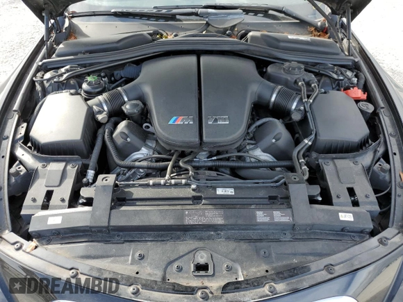 2010 BMW M6 z VIN WBSEH9C53ACY25369, wystawiony jako Copart lot #35884113 z przebiegiem 45 052 mil mil oraz Szkoda całkowita • Salvage title. Historia ofert i sprzedaży dostępna na DreamBid. Obrazek 11.