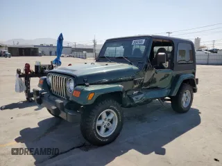 2000 Jeep Wrangler Sahara z VIN 1J4FA59S1YP746043, wystawiony jako Copart lot #58842665 z przebiegiem 148 348 mil mil oraz Szkoda całkowita • Salvage title. Historia ofert i sprzedaży dostępna na DreamBid. Obrazek 1.
