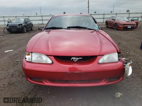 1997 Ford Mustang with VIN 1FALP4040VF166533, listed as a Copart auction lot 66524354 with 71,082 mi miles and Salvage Title. Bid and sale history available at carsss.com. Image 5.