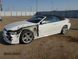 2018 BMW 6 Series z VIN WBA6F3C55JD994850, wystawiony jako Copart lot #75727994 z przebiegiem 20 112 mil mil oraz Szkoda całkowita • Salvage title. Historia ofert i sprzedaży dostępna na DreamBid. Obrazek 1.