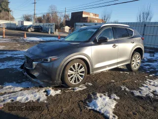 2023 Mazda CX-5 Signature with VIN JM3KFBXY8P0258573, listed as a Copart auction lot 42615075 with 18,916 mi miles and Salvage Title. Bid and sale history available at carsss.com. Image 1.