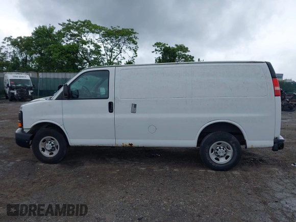2012 Chevrolet Express Cargo with VIN 1GCWGFFA8C1108597, listed as a IAAI auction lot 42323808 with 200,965 mi miles and . Bid and sale history available at DreamBid. Image 13.