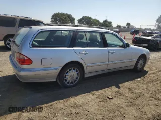 2001 Mercedes-Benz E-Class with VIN WDBJH65J01B276815, listed as a Copart auction lot 75748694 with 208,827 mi miles and Clean Title. Bid and sale history available at carsss.com. Image 3.