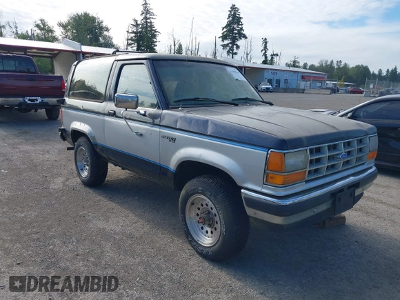 1989 Ford Bronco z VIN 1FMCU14T7KUB49671, wystawiony jako IAAI lot #42404266 z przebiegiem 22 883 mil mil oraz . Historia ofert i sprzedaży dostępna na DreamBid. Obrazek 1.