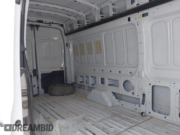 2023 Ford Transit Cargo z VIN 1FTBR3X83PKA97706, wystawiony jako IAAI lot #42253817 z przebiegiem 54 042 mil mil oraz . Historia ofert i sprzedaży dostępna na DreamBid. Obrazek 8.