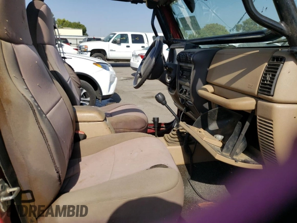 1999 Jeep Wrangler Sport with VIN 1J4FY19S5XP493117, listed as a Copart auction lot 57490792 with Not provided miles and Salvage title. Bid and sale history available at DreamBid. Image 5.