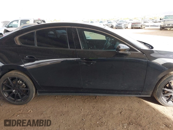 2023 Mazda 3 Premium Plus with VIN 3MZBPBEY6PM350056, listed as a IAAI auction lot 41940111 with 27,091 mi miles and . Bid and sale history available at DreamBid. Image 13.