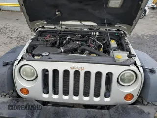 2007 Jeep Wrangler Unlimited X with VIN 1J4GA39177L105582, listed as a Copart auction lot 88912935 with 156,156 mi miles and Salvage Title. Bid and sale history available at DreamBid. Image 13.