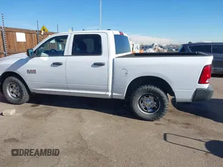 2015 Ram 1500 Tradesman with VIN 1C6RR7KG5FS660748, listed as a IAAI auction lot 41403779 with 201,127 mi miles and . Bid and sale history available at DreamBid. Image 14.