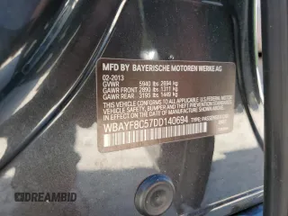 2013 BMW 7 Series 750Li xDrive with VIN WBAYF8C57DD140694, listed as a Copart auction lot 56983435 with 113,444 mi miles and Salvage title. Bid and sale history available at DreamBid. Image 12.