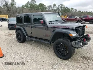 2018 Jeep Wrangler Unlimited Rubicon with VIN 1C4HJXFN9JW249214, listed as a Copart auction lot 42692175 with 161,157 mi miles and Salvage title. Bid and sale history available at DreamBid. Image 15.