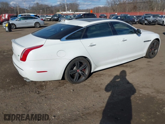 2015 Jaguar XJ with VIN SAJWA2EK9FMV87430, listed as a IAAI auction lot 41408797 with 101,147 mi miles and . Bid and sale history available at DreamBid. Image 4.