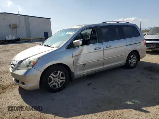 2006 Honda Odyssey EX-L z VIN 5FNRL38726B039670, wystawiony jako Copart lot #59730585 z przebiegiem 214 307 mil mil oraz Szkoda całkowita • Salvage title. Historia ofert i sprzedaży dostępna na DreamBid. Obrazek 1.