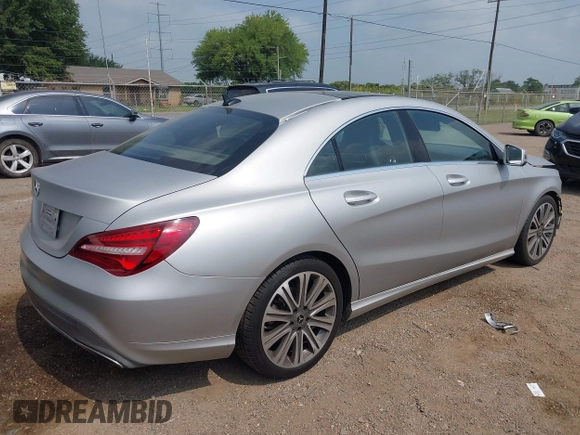 2018 Mercedes-Benz CLA 250 with VIN WDDSJ4EB4JN617063, listed as a IAAI auction lot 42205035 with 88,145 mi miles and . Bid and sale history available at DreamBid. Image 4.