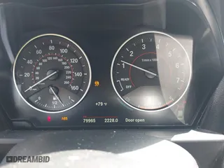 2016 BMW 2 Series 228i xDrive with VIN WBA1G9C50GVX97193, listed as a IAAI auction lot 41999973 with 79,965 mi miles. Bid and sale history available at carsss.com. Image 7.