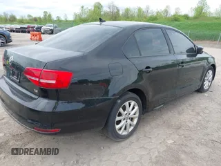 2015 Volkswagen Jetta SE z VIN 3VWD17AJ8FM321933, wystawiony jako IAAI lot #41177805 z przebiegiem 125 987 mil mil oraz . Historia ofert i sprzedaży dostępna na DreamBid. Obrazek 4.
