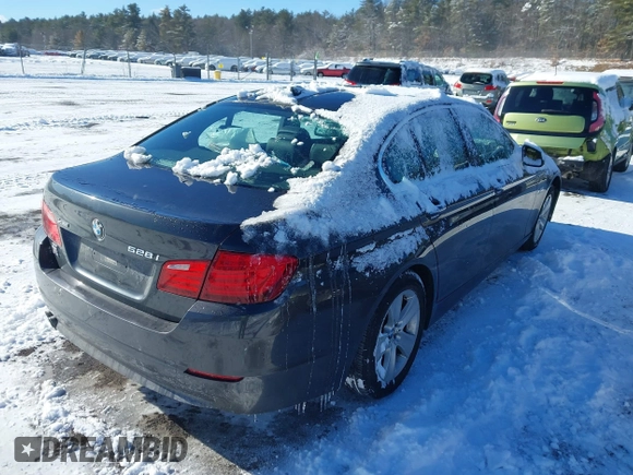 2013 BMW 5 Series 528i xDrive with VIN WBAXH5C55DDW12945, listed as a IAAI auction lot 41343124 with 137,672 mi miles and . Bid and sale history available at carsss.com. Image 4.