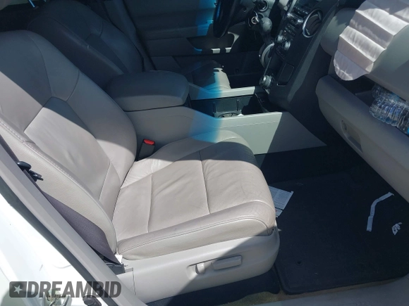 2014 Honda Pilot EX-L with VIN 5FNYF3H75EB015607, listed as a IAAI auction lot 41935074 with 110,713 mi miles and . Bid and sale history available at carsss.com. Image 5.