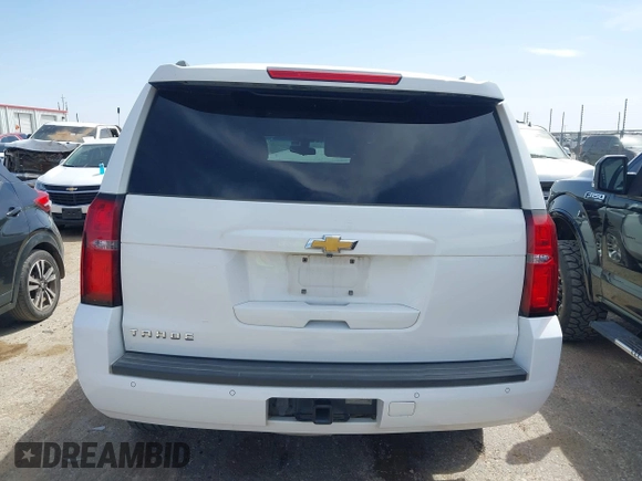 2015 Chevrolet Tahoe LS with VIN 1GNSCAKC3FR687421, listed as a IAAI auction lot 41930895 with Not provided miles and . Bid and sale history available at DreamBid. Image 16.